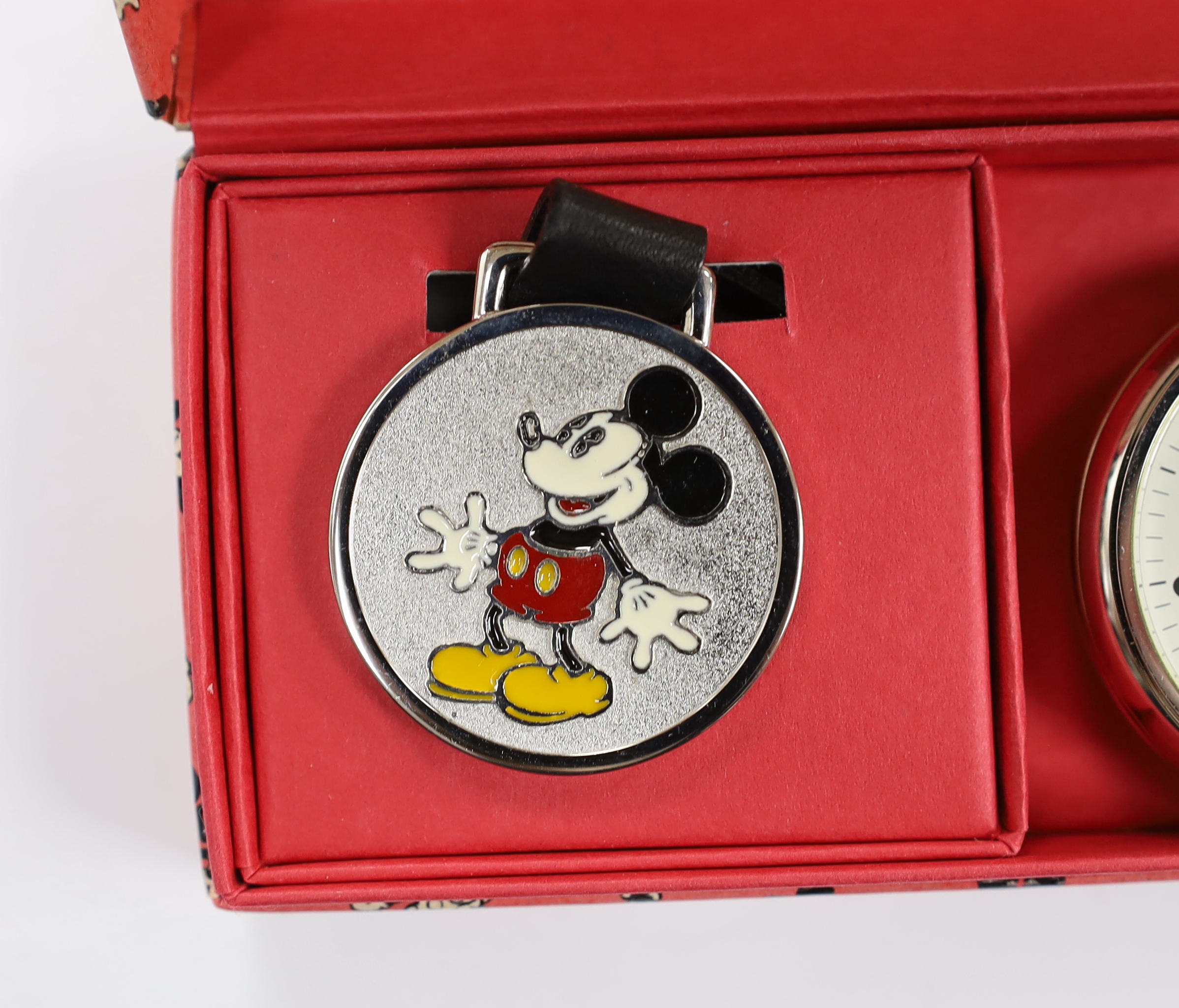 A boxed limited edition Ingersoll Watch Company Mickey Mouse pocket watch and medallion, numbered 4013/5000, case diameter 44mm.